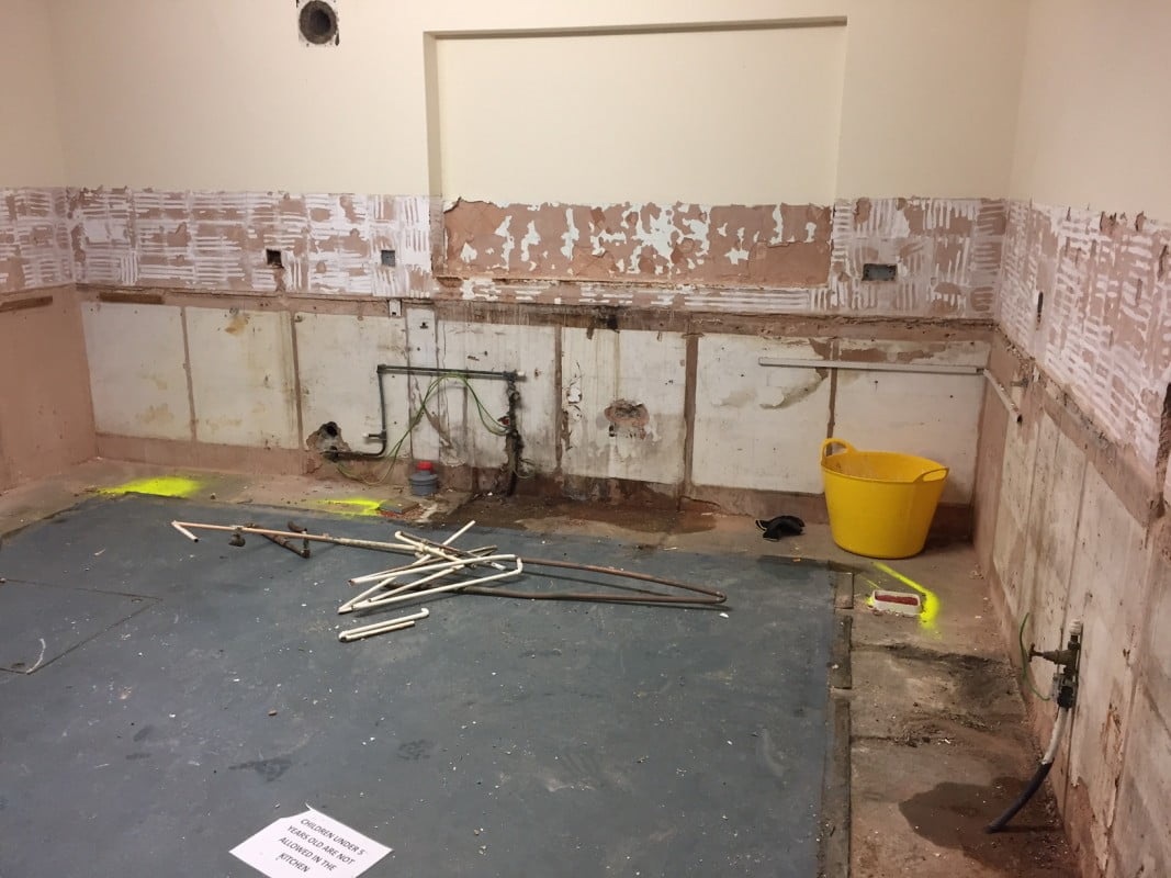 Image of former existing toilet and meeting room before conversion took place 